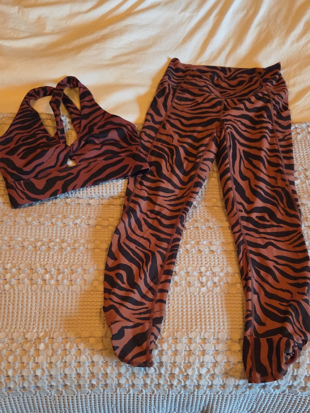 Fabletics Rust and Black Zebra-Print Sports Bra & Leggings